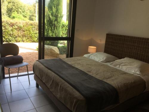 Postel nebo postele na pokoji v ubytování villa standing piscine chauffée privée