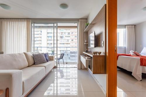 En eller flere senge i et værelse på Df plaza - apto luxo, 2 ar condicionados e suíte