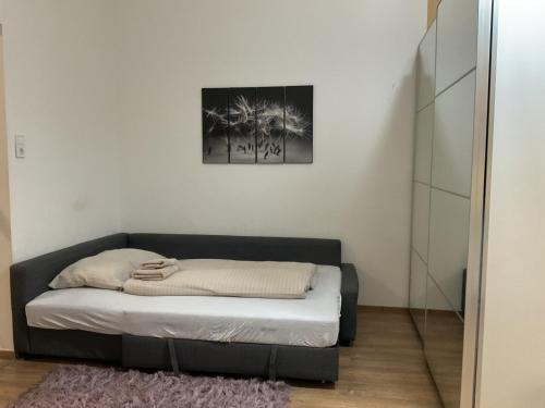 En eller flere senge i et værelse på Grand View Apartment