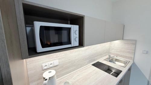 Η κουζίνα ή μικρή κουζίνα στο Apartmány Perfect Home