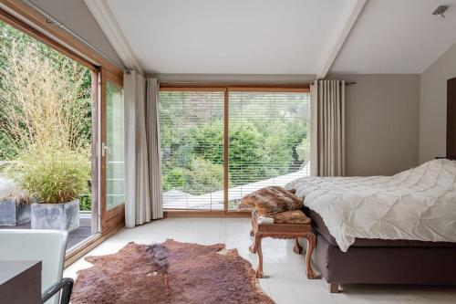 Ένα ή περισσότερα κρεβάτια σε δωμάτιο στο Villa Nolan