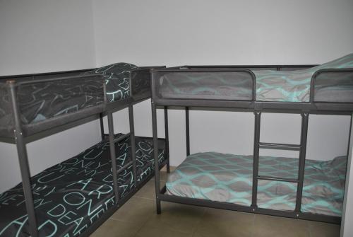 a couple of bunk beds in a room at Maison Océan Moliets in Moliets-et-Maa