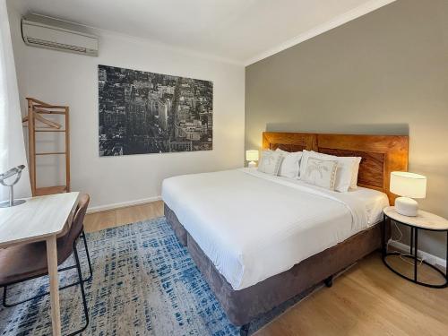 Postel nebo postele na pokoji v ubytování Cute 1 bedroom with sunny courtyard garden