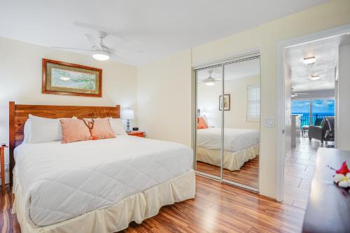 Postel nebo postele na pokoji v ubytování Pono Kai Resort B203