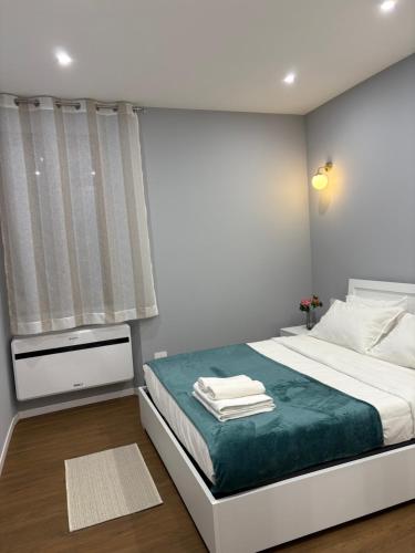 Ένα ή περισσότερα κρεβάτια σε δωμάτιο στο AB apartment Pistoia