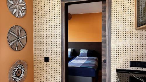 Postel nebo postele na pokoji v ubytování Jacaranda