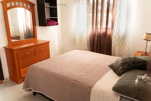 Postel nebo postele na pokoji v ubytování Terraza Lotelazo