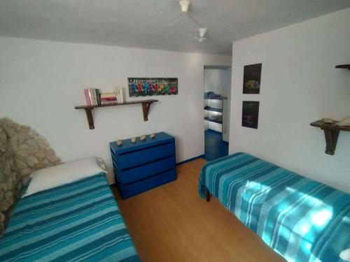 Ένα ή περισσότερα κρεβάτια σε δωμάτιο στο Appartamenti Jeko