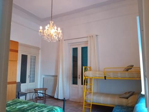 Ένα ή περισσότερα κρεβάτια σε δωμάτιο στο Terrazza Adriatica