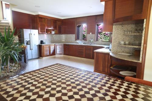 Kuchyň nebo kuchyňský kout v ubytování Villa Tizra - Guest house