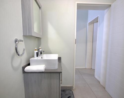 Koupelna v ubytování PC Luxe Stays exquisite apartments