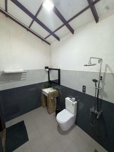 Phòng tắm tại Sigiri Resort