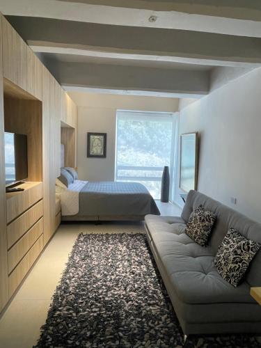 Posezení v ubytování Moderno apartamento en North Point estudio 2