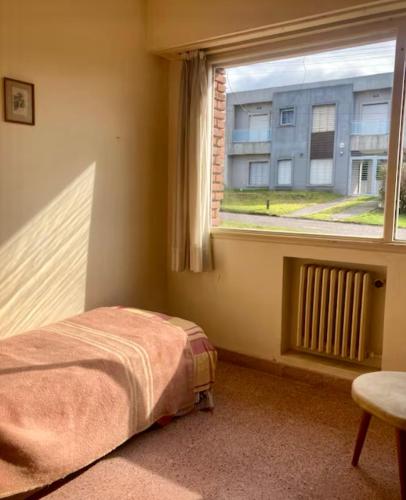 Ένα ή περισσότερα κρεβάτια σε δωμάτιο στο Hotel de la Poesía