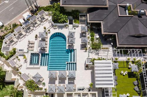 an overhead view of a house with a blue door at QT Gold Coast in Gold Coast