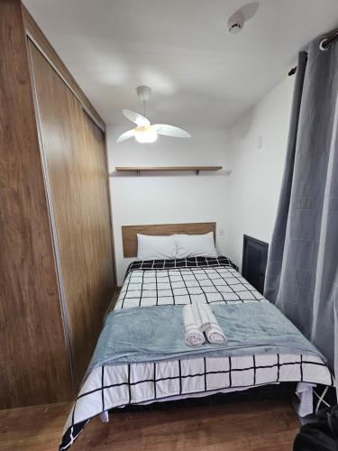 Postel nebo postele na pokoji v ubytování Wood One - Apto com varanda e Fácil acesso ao Metrô e Expo Imigrantes