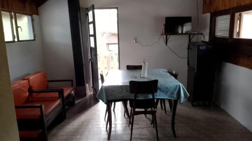 a dining room with a table with a candle on it at Okin 9 cristina in Costa del Este