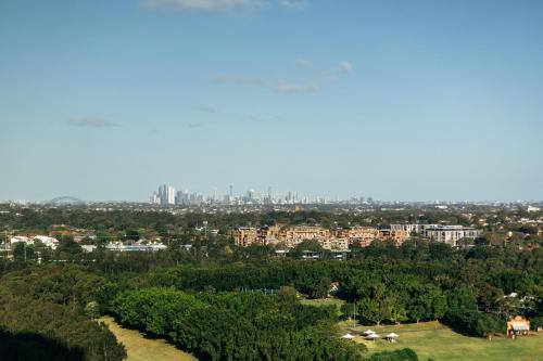 a view of the city from the top of a hill at Horizon King-bed Lux Apt Free Parking in Sydney