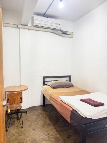 Llit o llits en una habitació de 42 Guest House