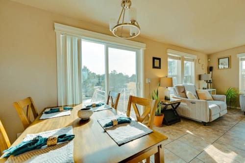 a dining room with a table and a living room at Scenic Grand Canyon Hideaway 2BD Superhost in Williams