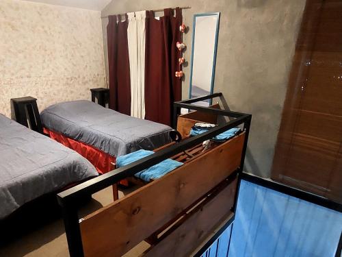 Giường trong phòng chung tại La Loma del Valle