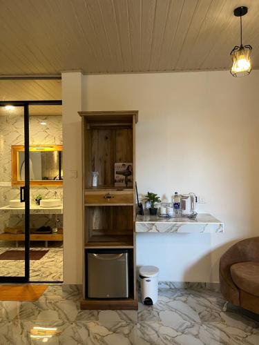 Η κουζίνα ή μικρή κουζίνα στο The Bliss Ella