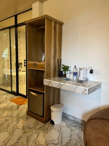 Η κουζίνα ή μικρή κουζίνα στο The Bliss Ella