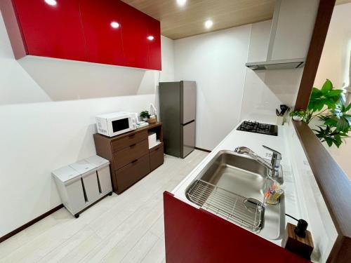 Η κουζίνα ή μικρή κουζίνα στο Value Residence Hotel 久貝