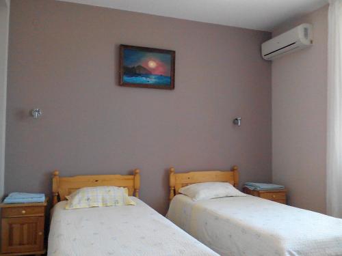 Katil atau katil-katil dalam bilik di Guesthouse Mirage
