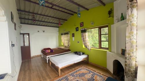 En eller flere senge i et værelse på Cloudy stay