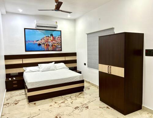 Ένα ή περισσότερα κρεβάτια σε δωμάτιο στο Sandhika Retreat