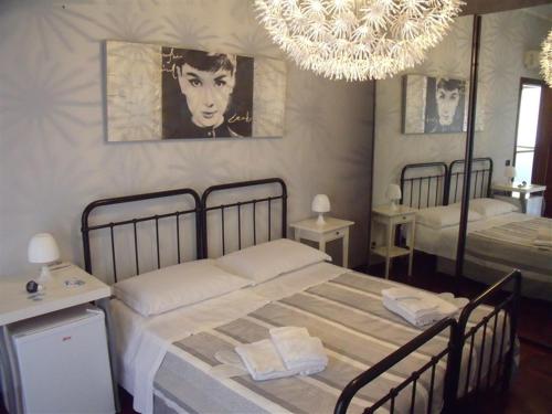 Кровать или кровати в номере Bed and Breakfast Il Vicolo