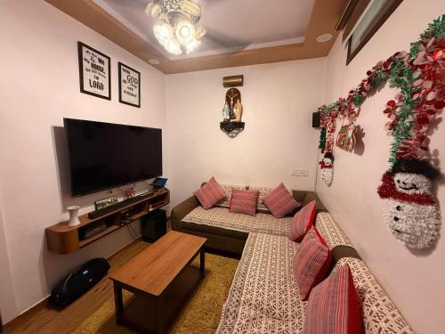 Μια τηλεόραση ή/και κέντρο ψυχαγωγίας στο Sunset view homes