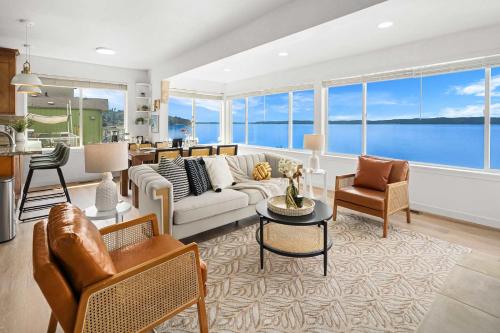a living room with a couch and a table at Water View Retreat Near Beach Park & City in Redondo