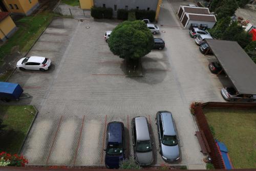 a group of cars parked in a parking lot at LD PALACE Spa & Kur in Františkovy Lázně
