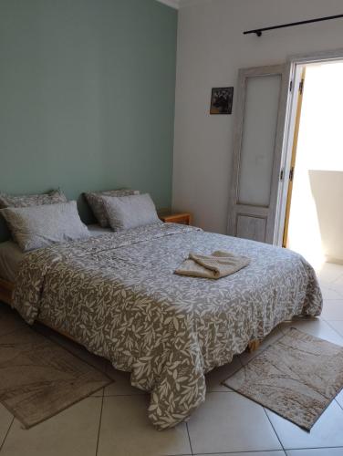 Postel nebo postele na pokoji v ubytování lumière de sud