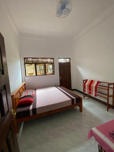 Postel nebo postele na pokoji v ubytování Diyaluma Villa Resort