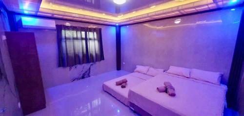 Ένα ή περισσότερα κρεβάτια σε δωμάτιο στο Vel Serene Villa