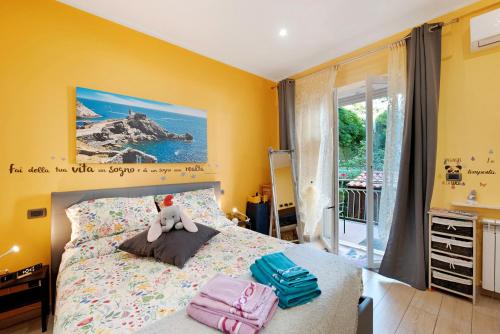 a bedroom with a bed with two bags on it at Oparavisegenova in Genova