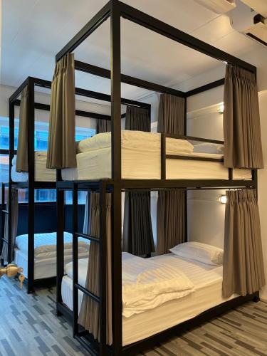 a bunk bed room with two bunk beds at One life Hostel in Chiang Mai