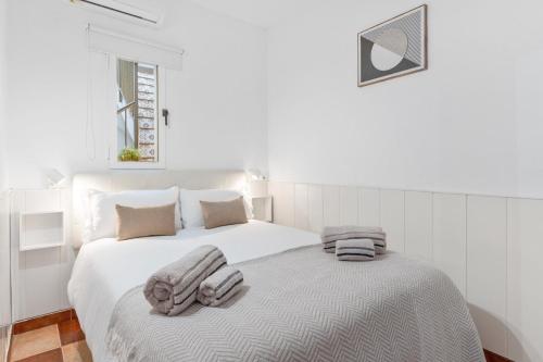 Ένα ή περισσότερα κρεβάτια σε δωμάτιο στο Casa Marbella