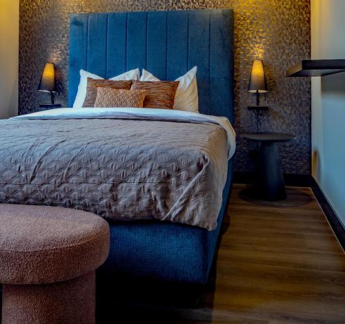 Ένα ή περισσότερα κρεβάτια σε δωμάτιο στο De Nassau - In de winkelstraat