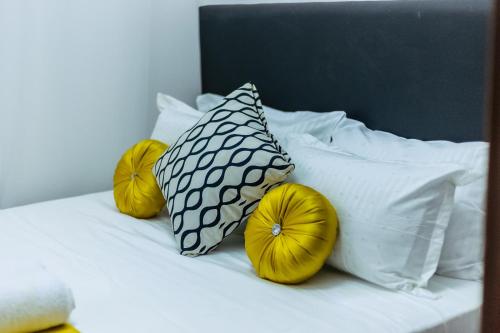 Postel nebo postele na pokoji v ubytování Hankscom apartments