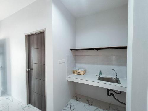 Koupelna v ubytování บ้านพักธามไทน์