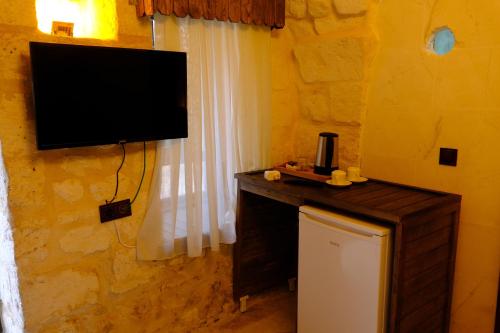 Kuchyň nebo kuchyňský kout v ubytování sumatra otel