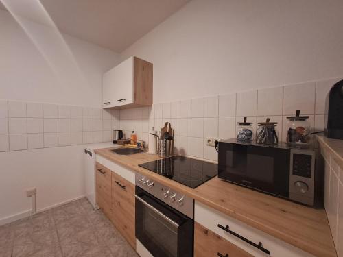 Η κουζίνα ή μικρή κουζίνα στο Livoro Apartments