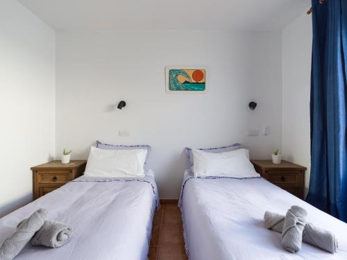 Una cama o camas en una habitación de Cotillo Horizon