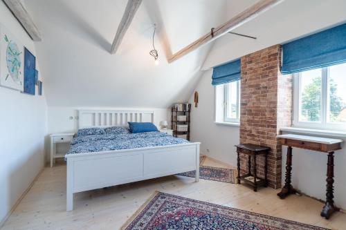 Ένα ή περισσότερα κρεβάτια σε δωμάτιο στο Chalupa Bobrůvka