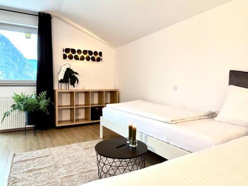 Ένα ή περισσότερα κρεβάτια σε δωμάτιο στο Appartement Mona