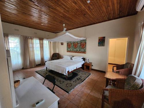 Postel nebo postele na pokoji v ubytování Sungeni Cottage @ Lake Malawi